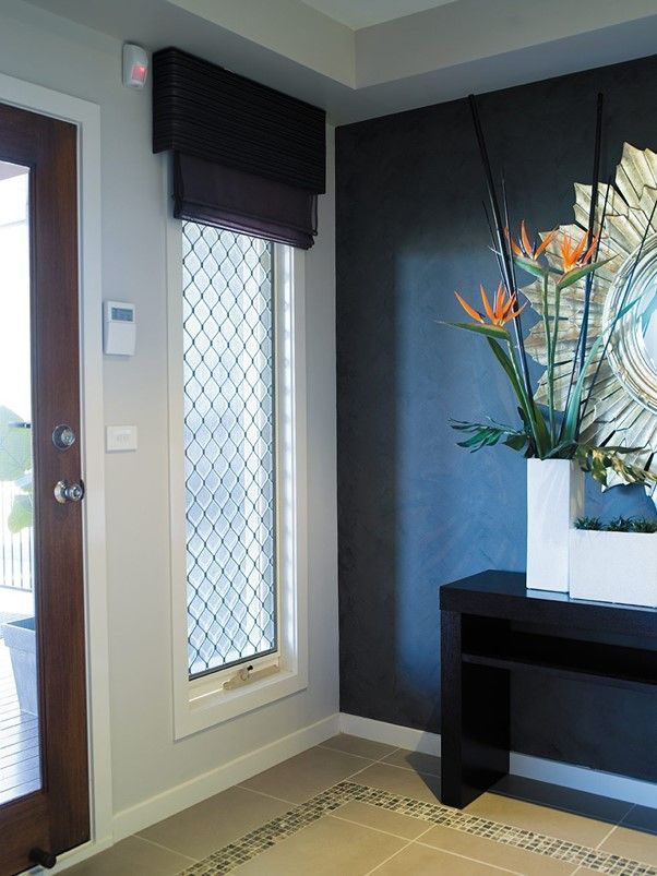 Stylish Diamond Grille Security Screen Door for Modern Homes Elegant diamond grille security screen door with premium mesh security screens, designed to protect your home with style.